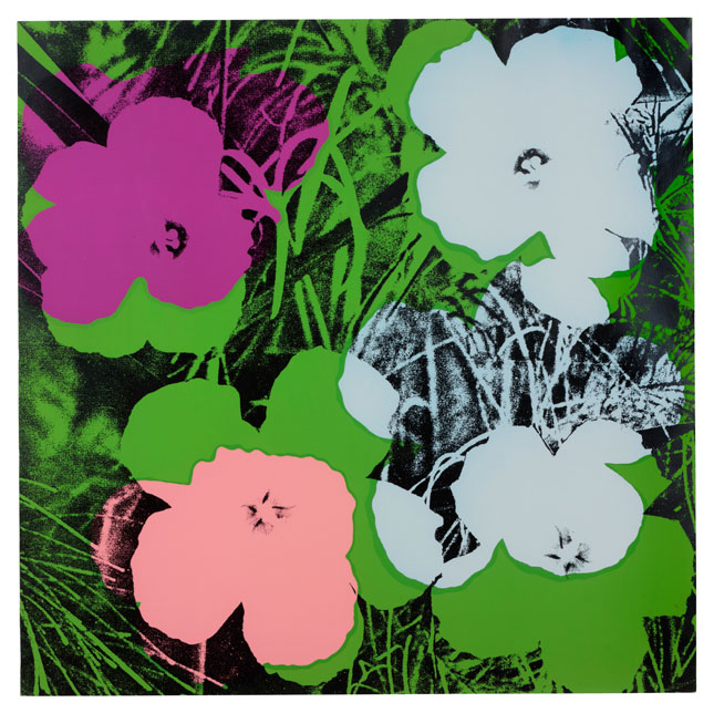 Flowers, 1970: A vibrant silkscreen by Andy Warhol. The image features brightly colored flowers, daisies, in shades of red, yellow, and pink against a dark background. The flowers are stylized and flat, typical of Warhol’s Pop Art style.